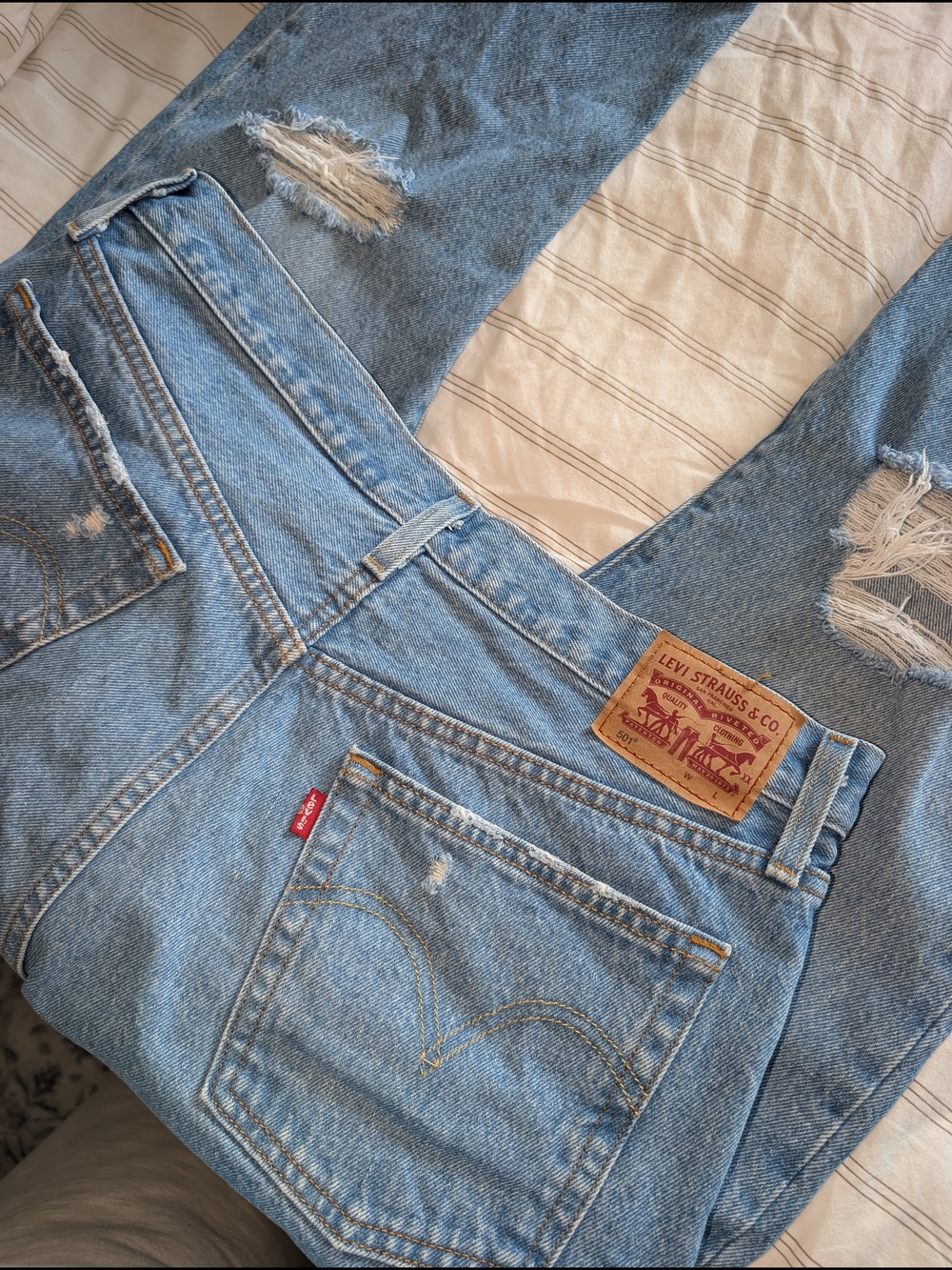 Levi's Light Blue Straight Leg Distressed Jeans
